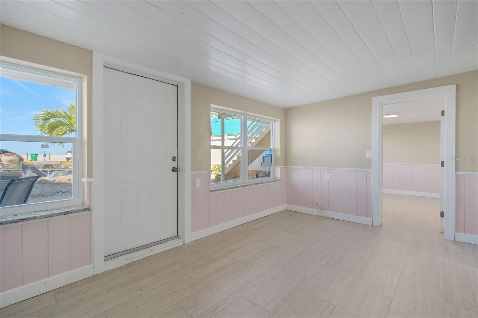 LIVING ROOM LOOKING INTO BEDROOM