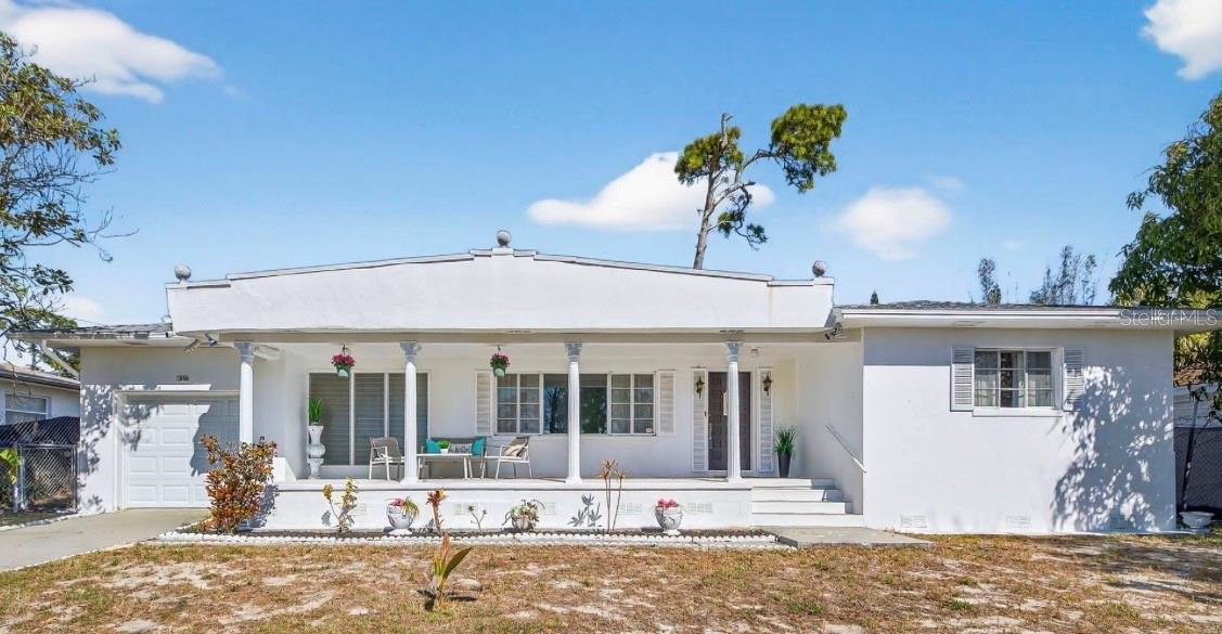 This charming 3-bedroom, 1-bath residence offers nearly 1,400 square feet of comfortable living space