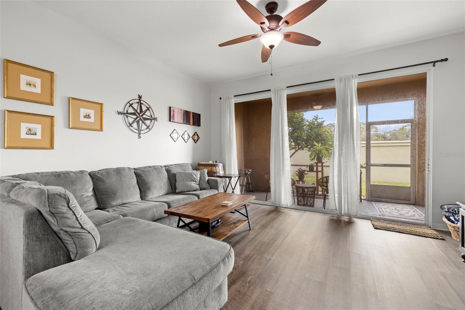 Living room, slider doors onto enclosed patio
