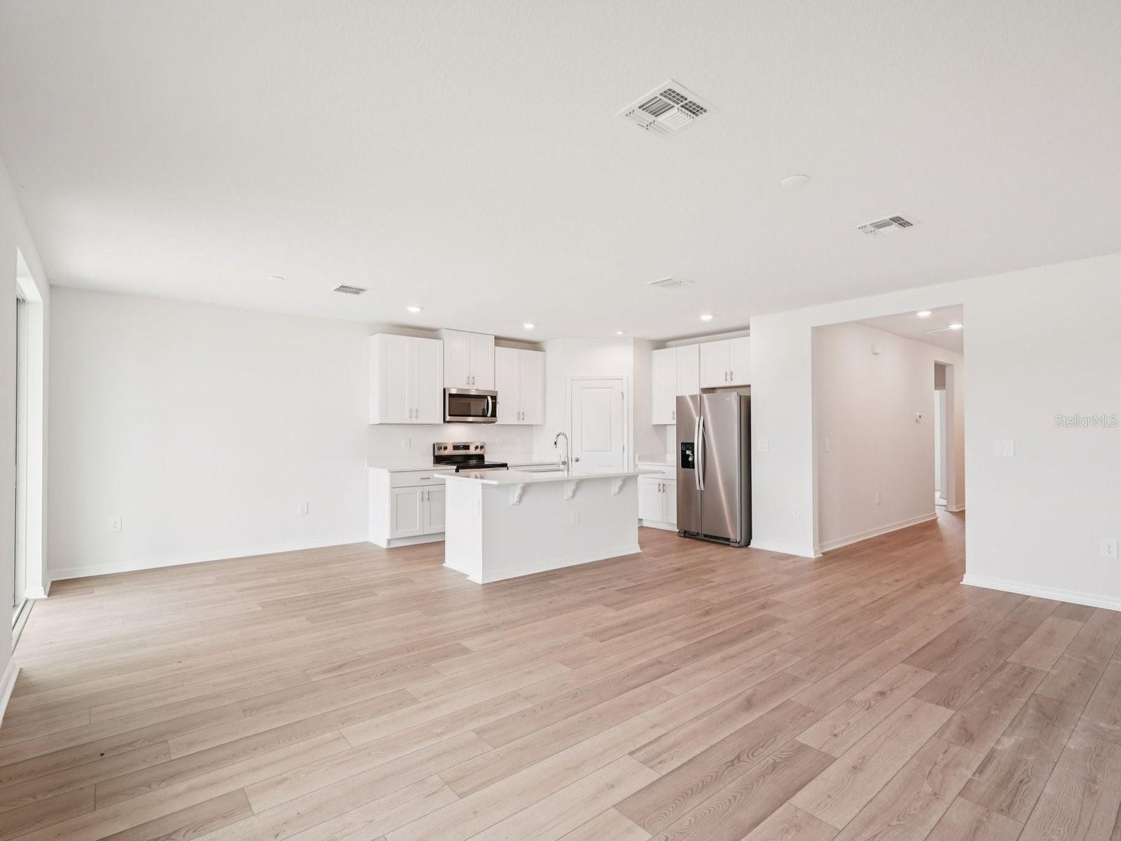 Photos are not of the actual home, but are photos of the builder home with same floorplan with similar interior finishes.