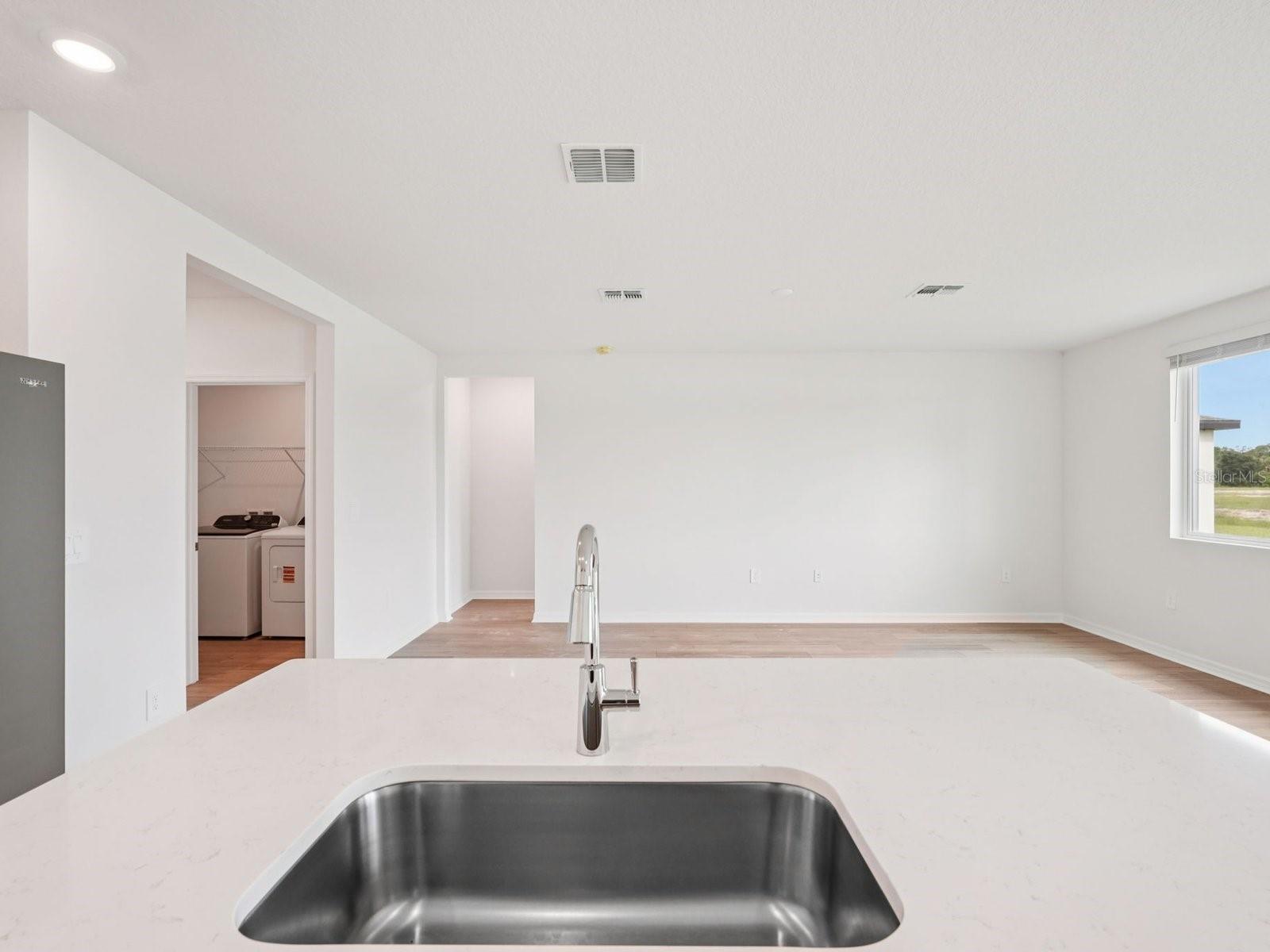 Photos are not of the actual home, but are photos of the builder home with same floorplan with similar interior finishes.