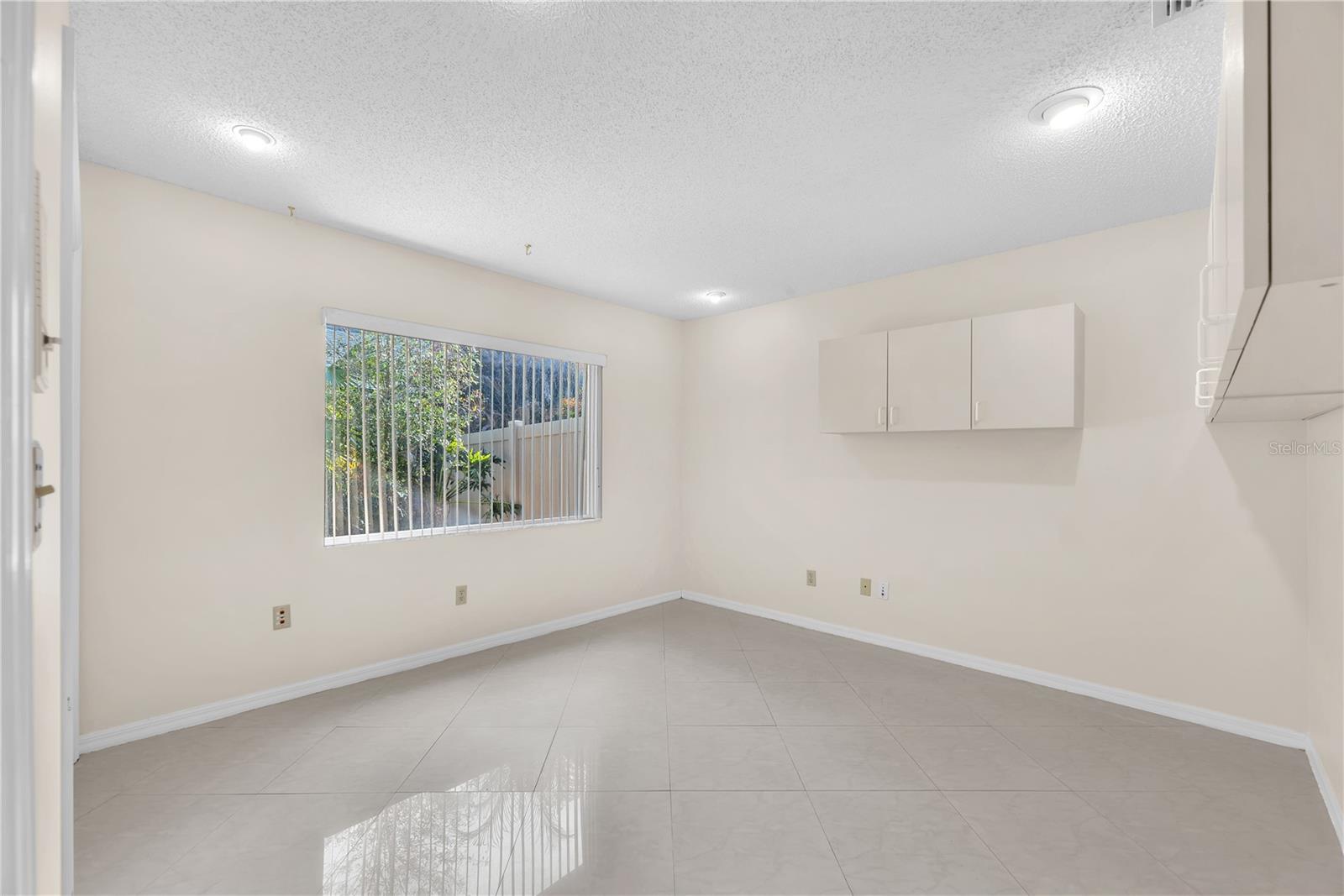 Bedroom #4 is spacious and has a built-in closet and access to the share bathroom in the hall.