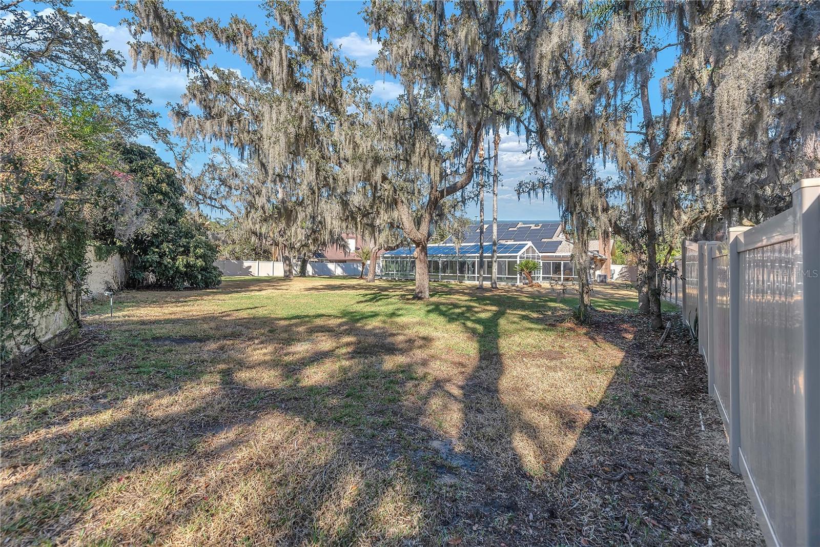 View from the back of this lot shows how large the back yard is to give buyers endless outdoor possibilities.