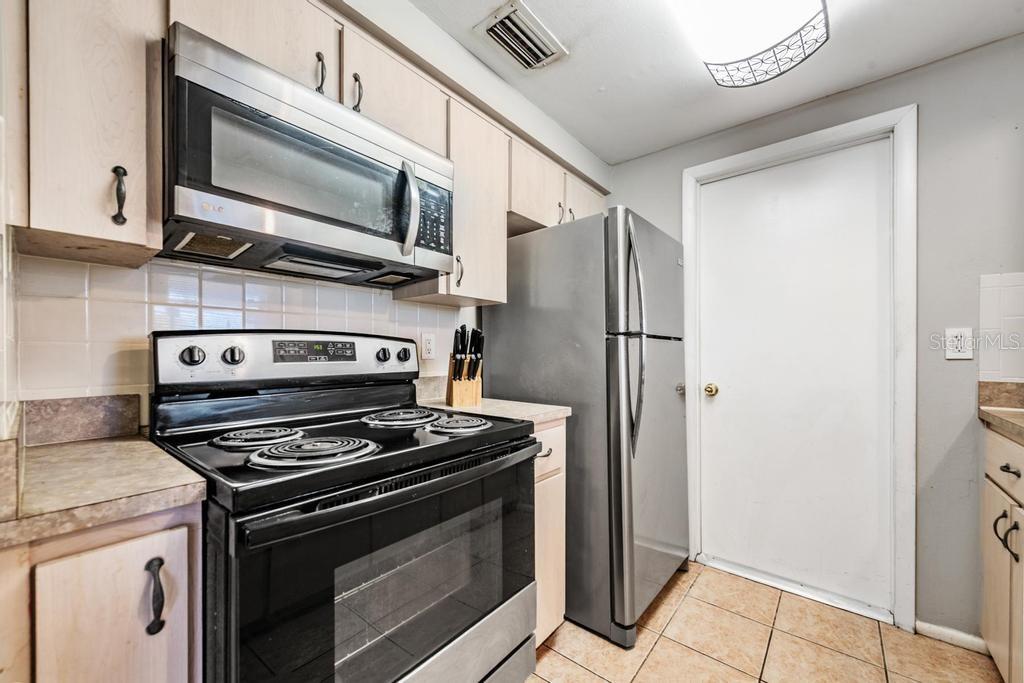Kitchen with Stainless Steel appliances.