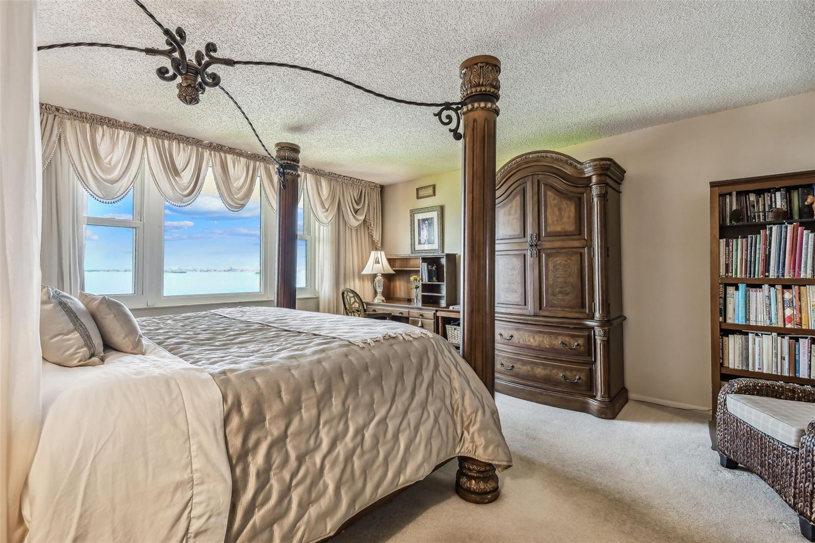 Primary bedroom with unobstructive water view