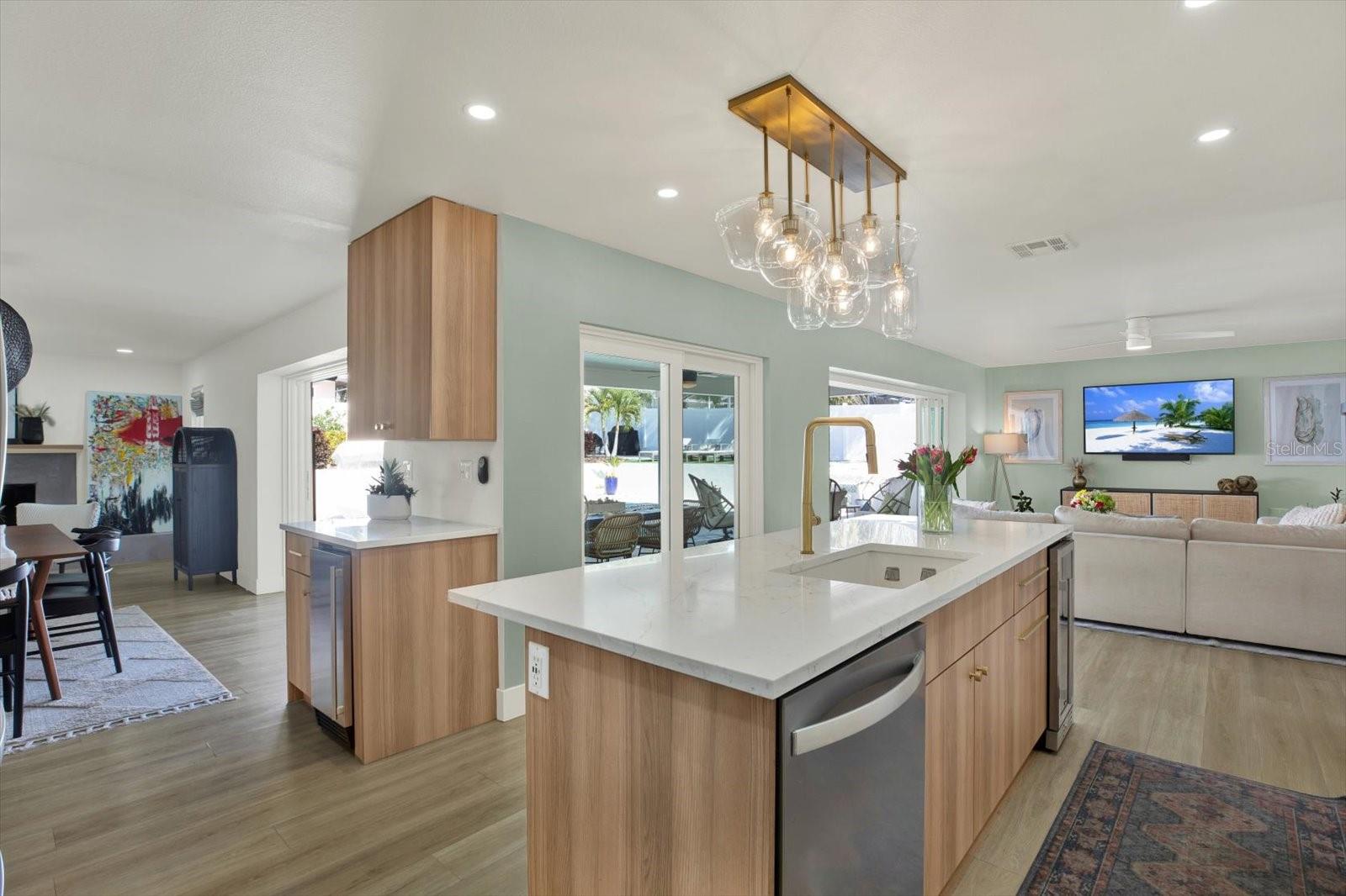 Dry bar with ice maker easy access to kitchen