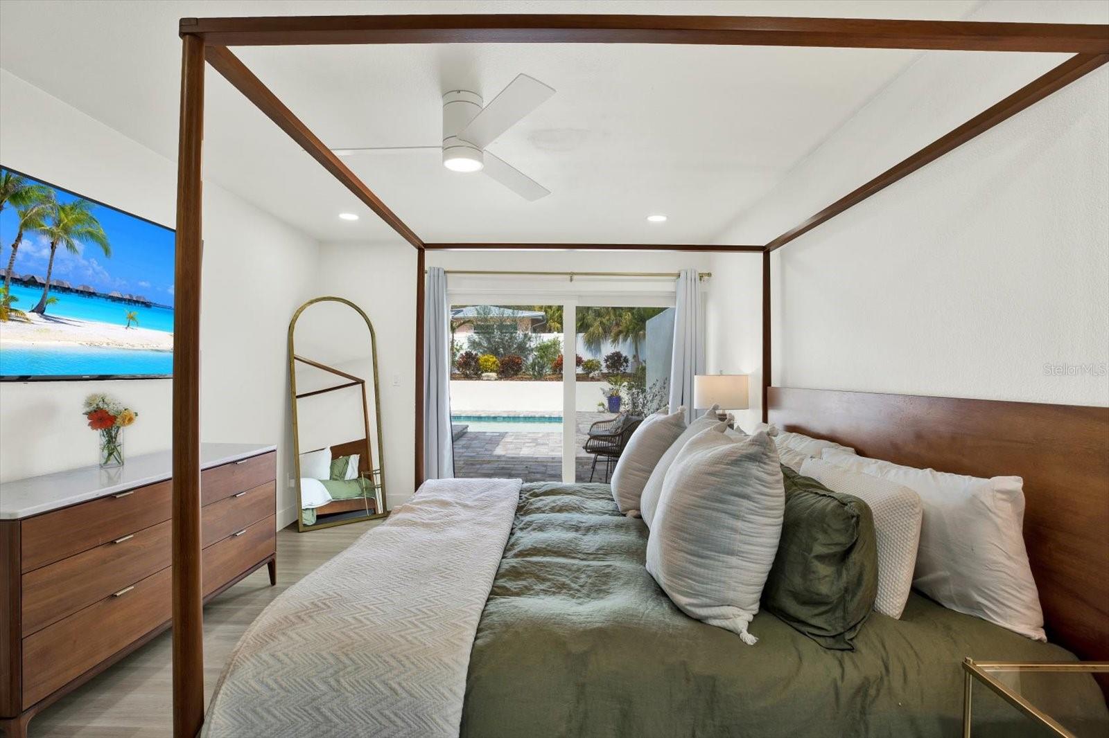 Primary Bedroom overlooking Pool area