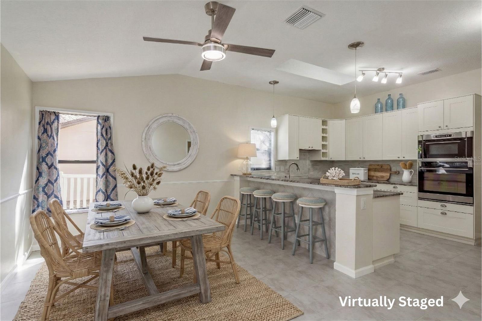 dining room and kitchen - virtually staged