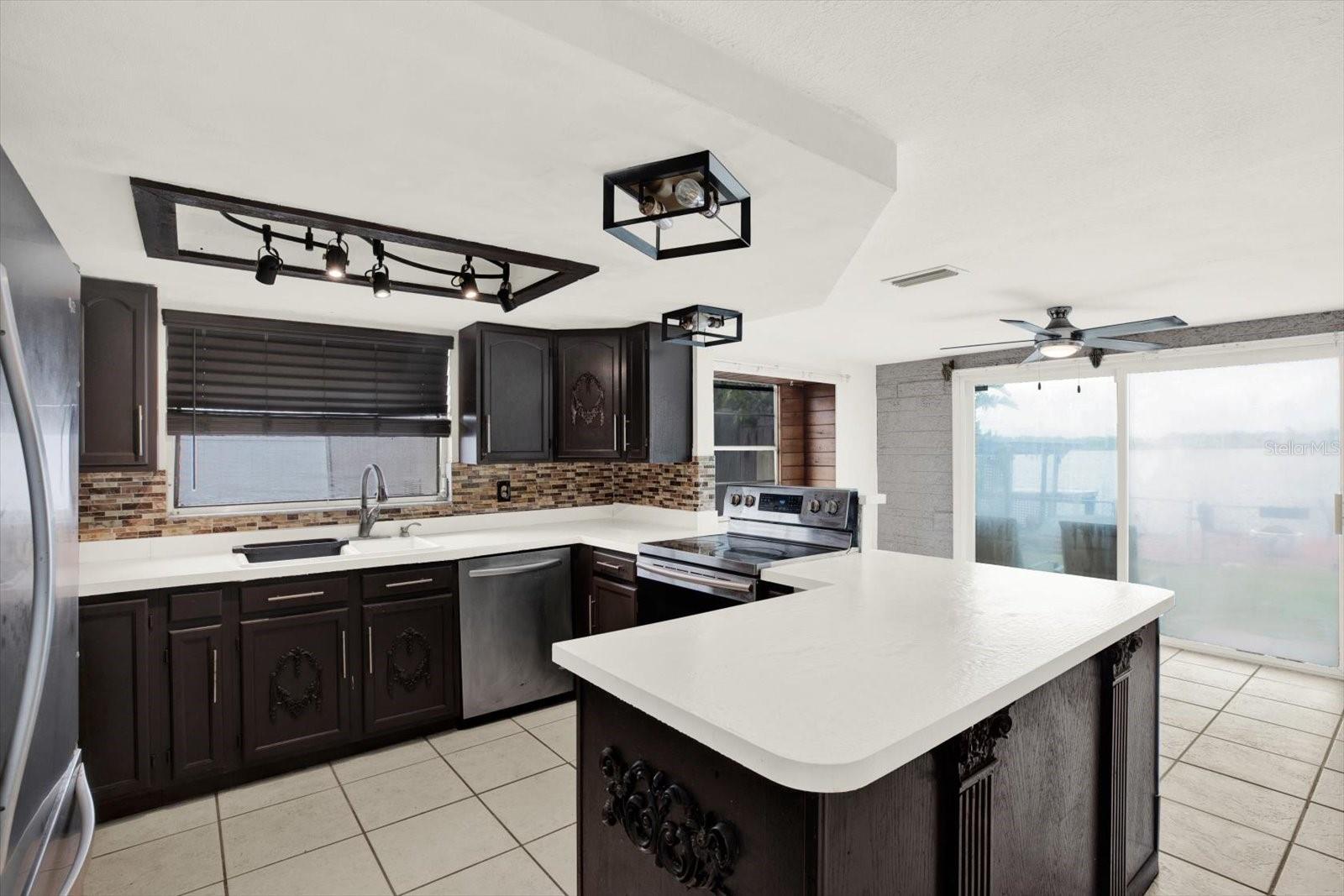 Stare out to the lake while cooking your meals