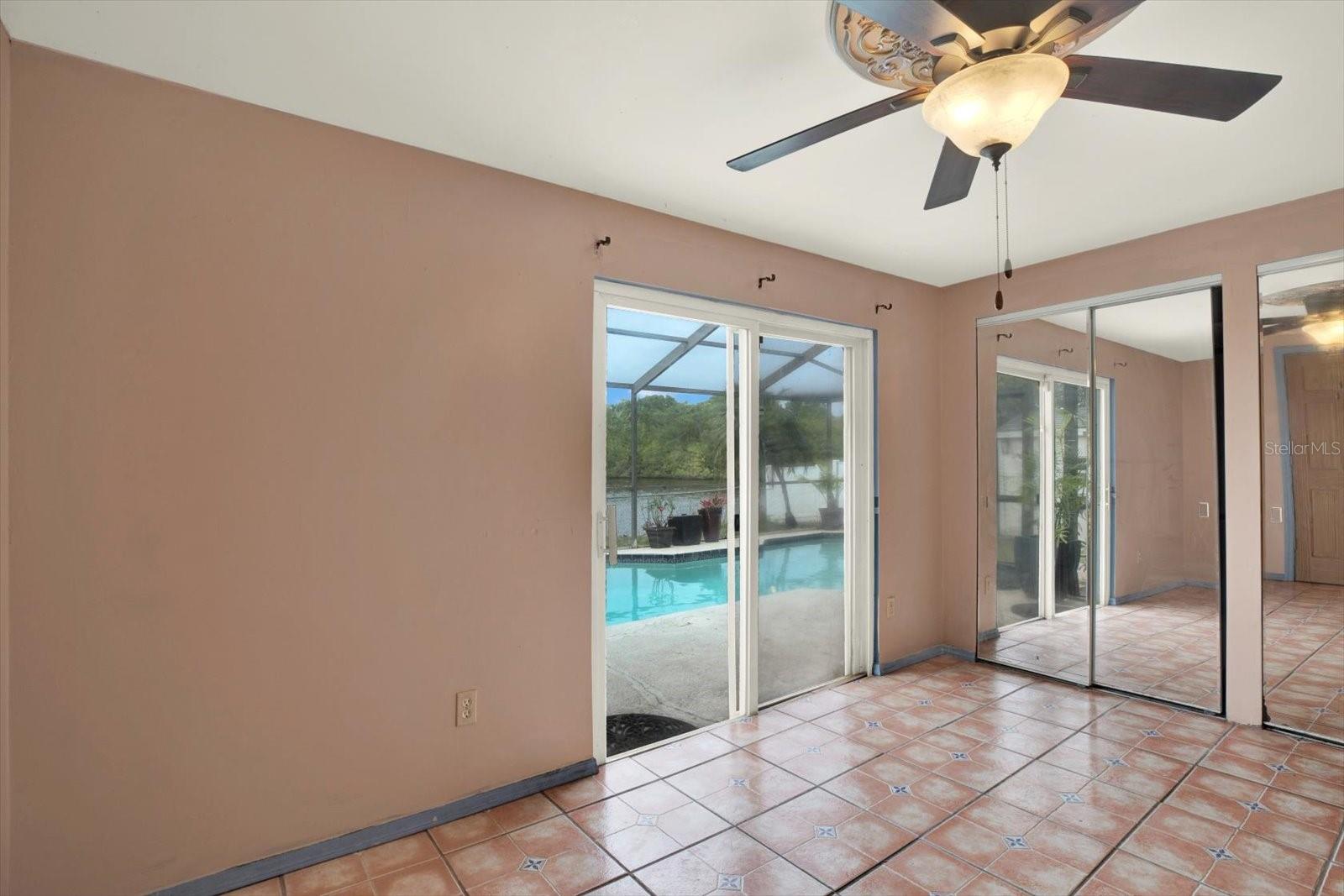 Bedroom in rear of home with access to the lanai