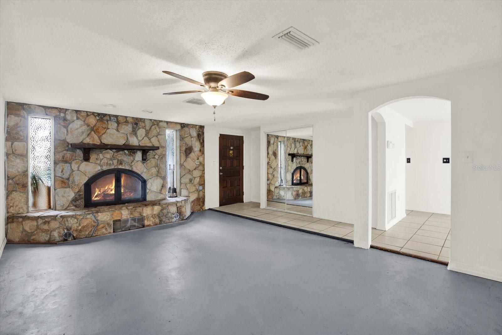 Welcoming to your large living room with fireplace