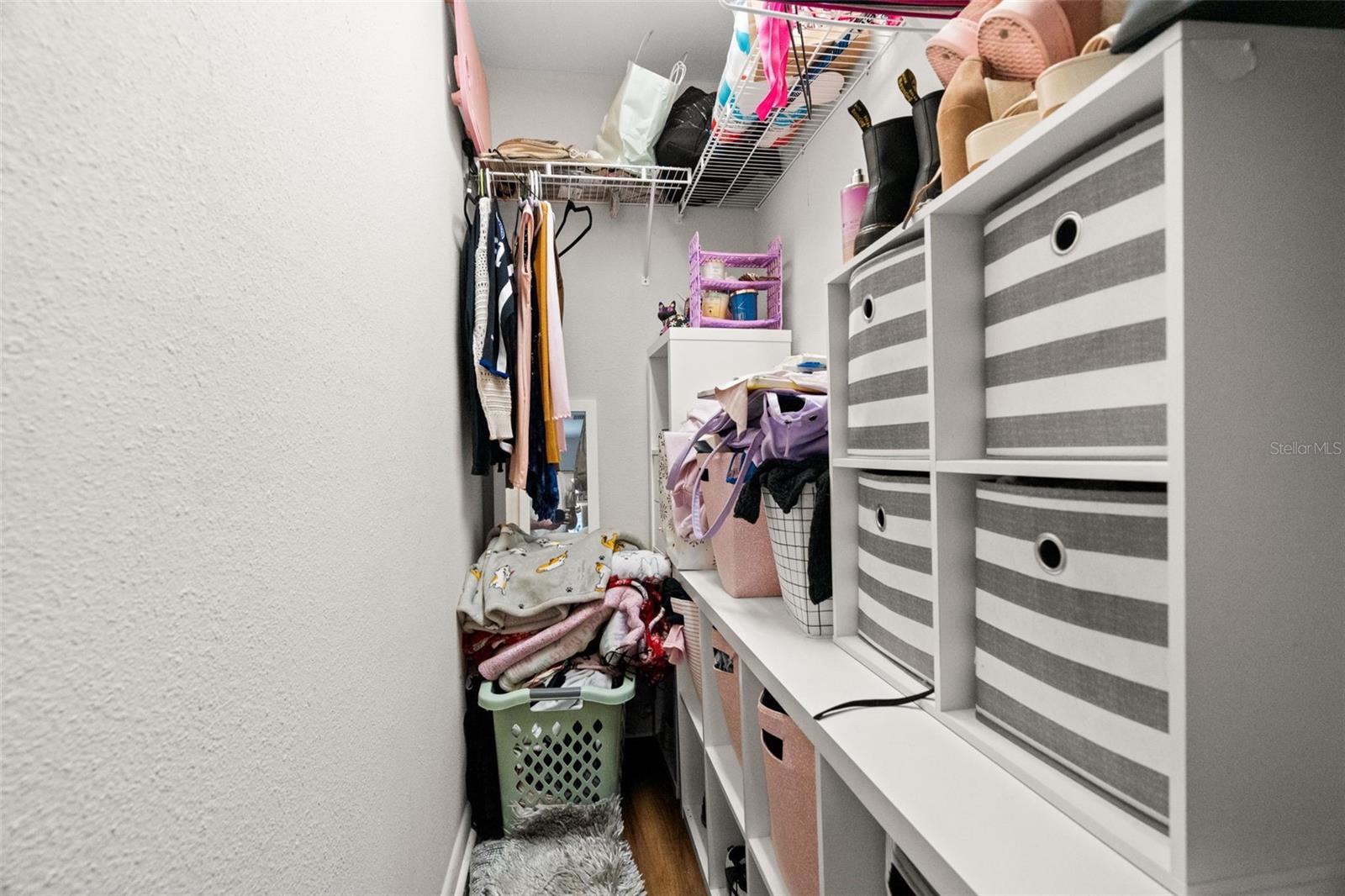 Primary walk-in closet.