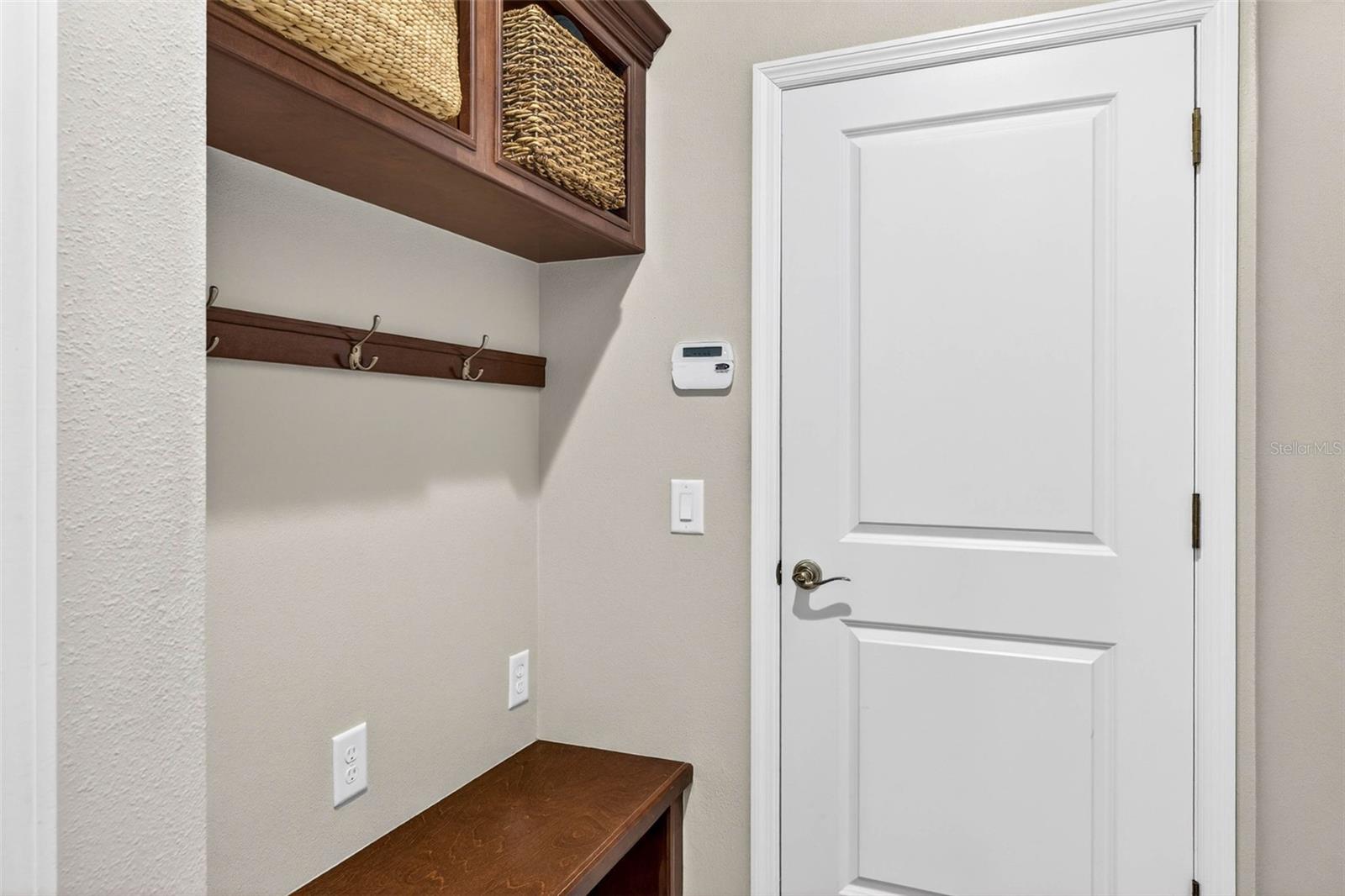 Catch all area by the garage.