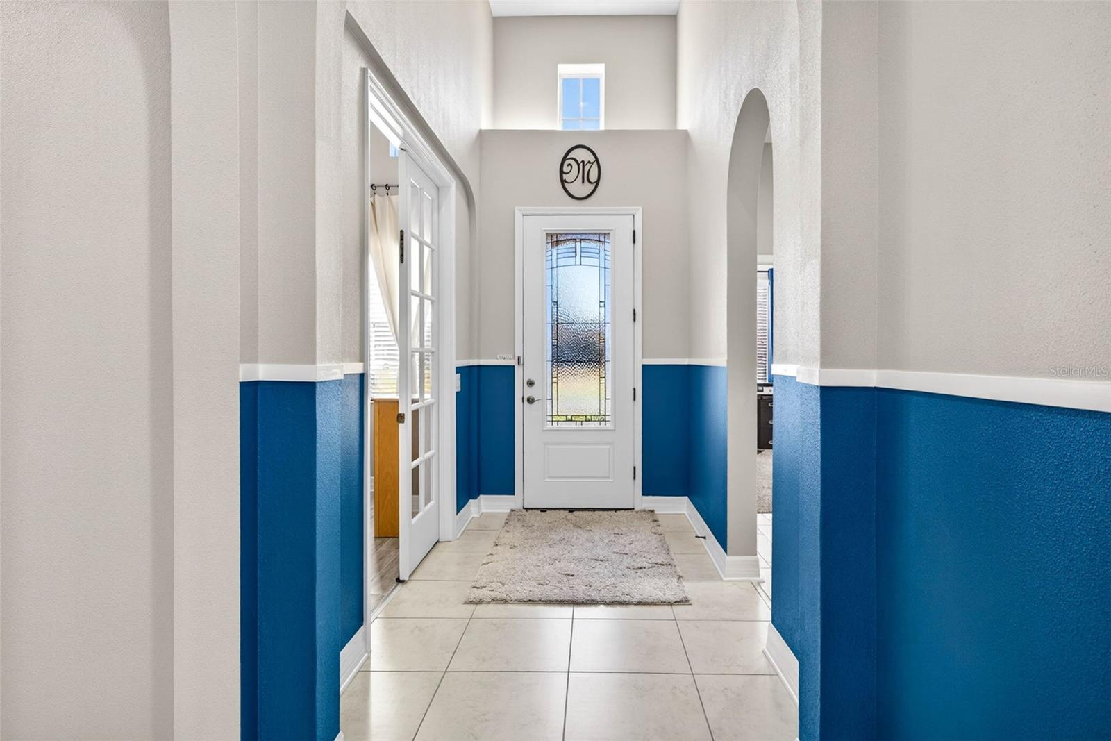 Long hallway accented with separated space.