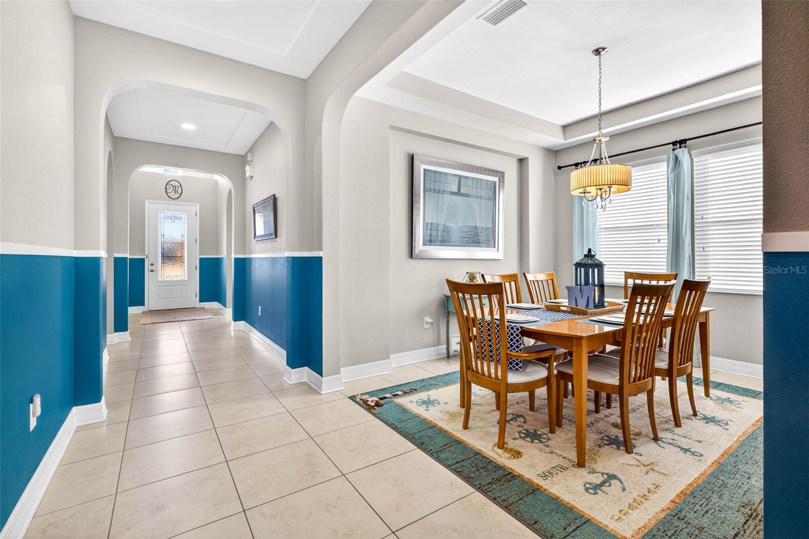 Dining area adjacent to the kitchen as a separate space for entertaining.