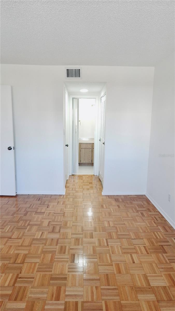 Master Bedroom looking at entry to closets and Bathroom