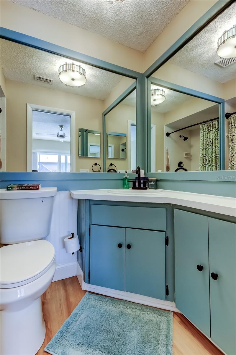 14. Primary Ensuite Bathrm (4.8' x 7.11') New Matte Black Plumbing Fixtures, LVP Floors, Lighting, Toilet!!