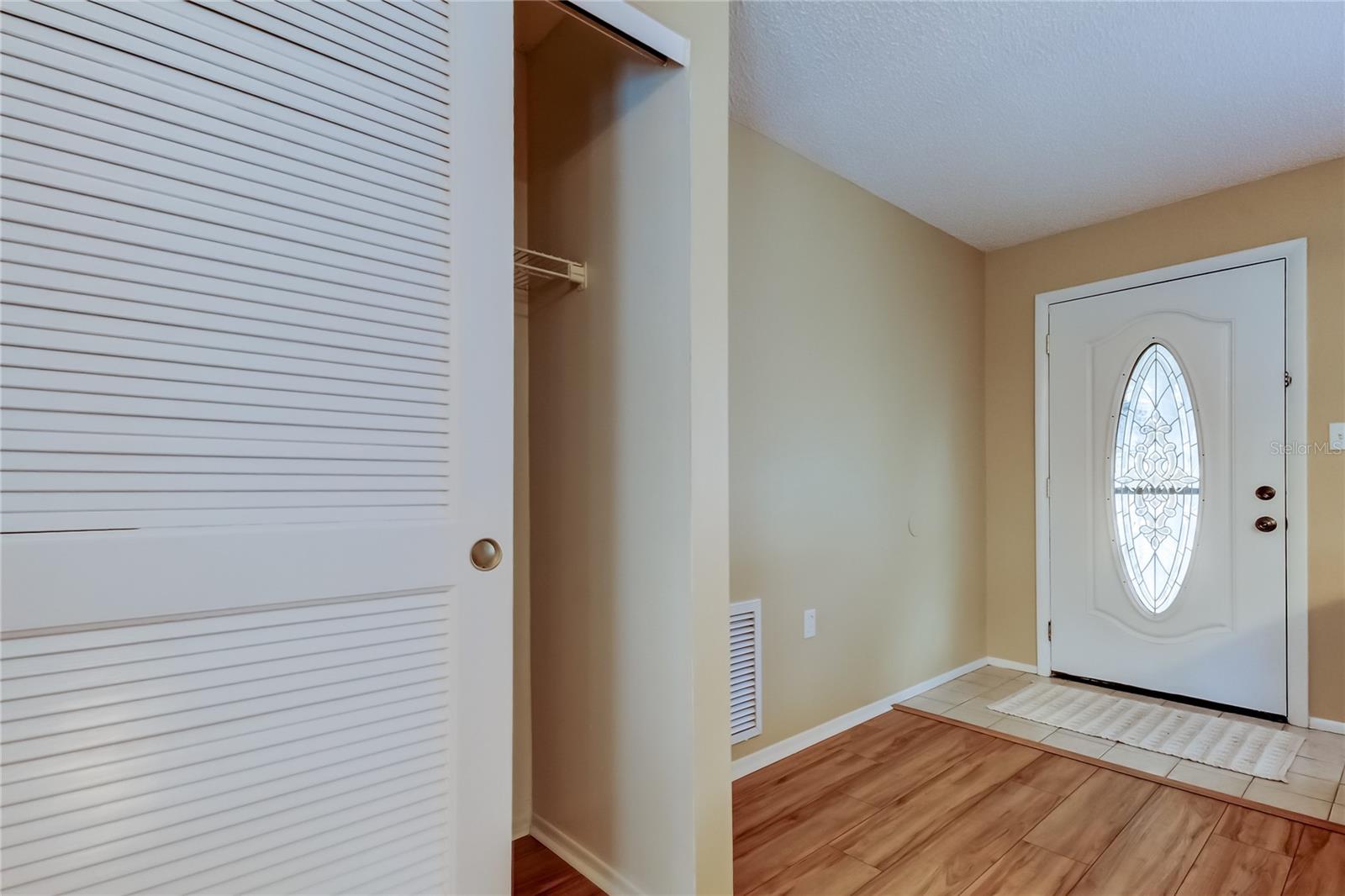 24. Tiled Foyer (3.8' x 5.6').. w LARGE Storage Closet!