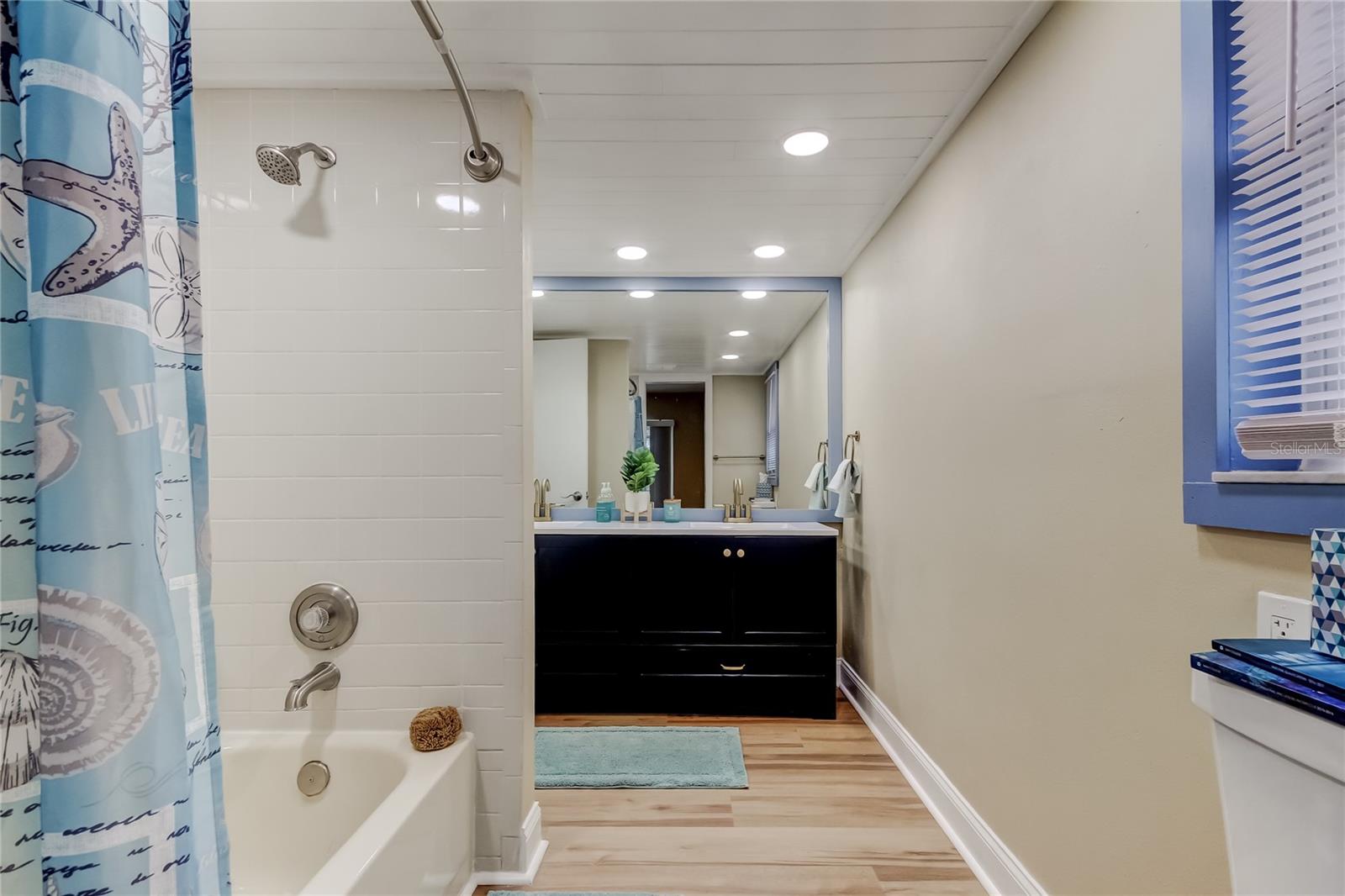 56. Bathrm #2 (10.1' x 6.11') Tub w Shower, New Dual Sink Vanity, Toilet, LVP, Lighting, Plumbing Fixtures!!