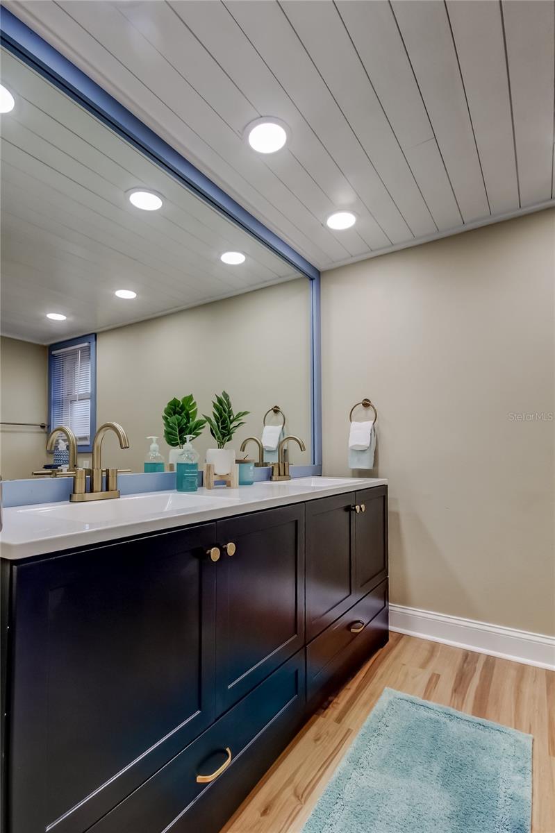 57. Coastal Shiplap Ceiling in Jack n Jill Bath, w Direct Access to Bed #2 + Hallway Access for Bed #3!