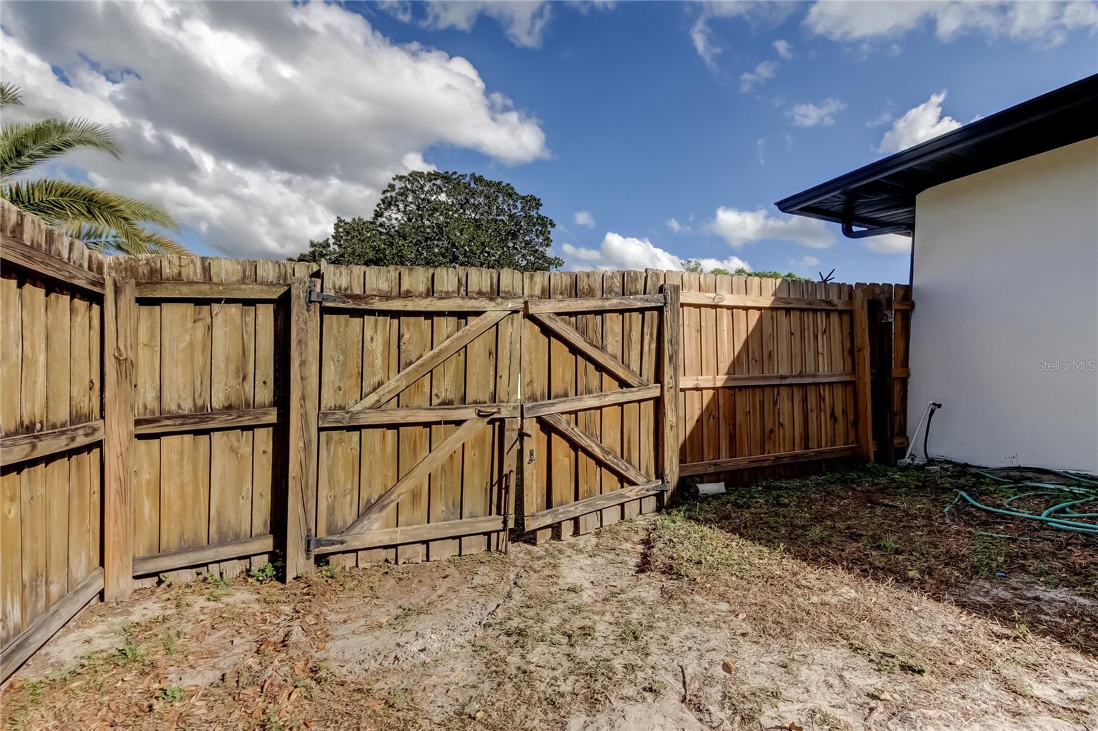 68. Dual Gated Entrance into Backyard from Side Yard.. Makes for Easy Lawncare!!