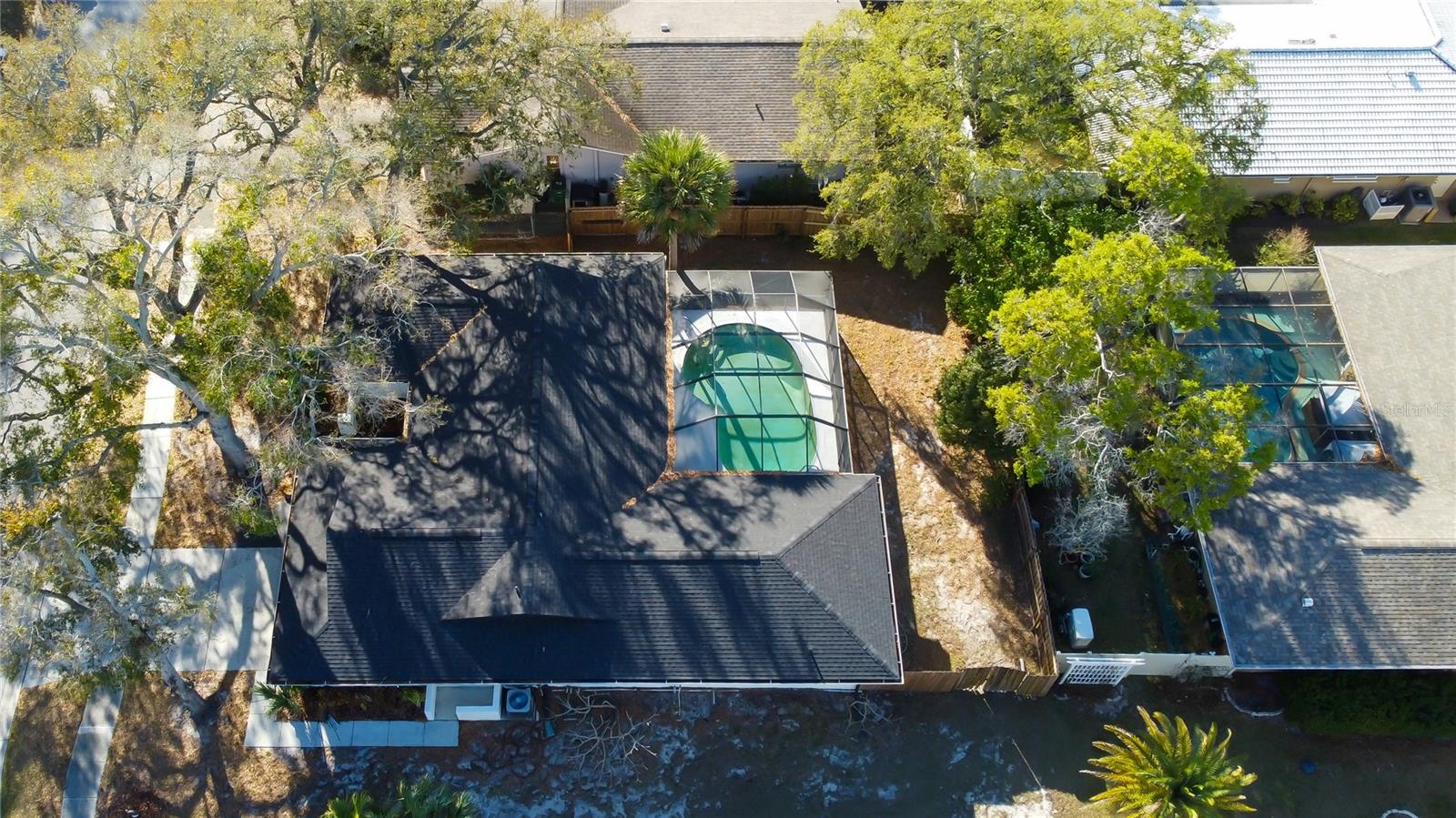 76. Modern Aesthetic with Black & White Exterior.. Roof is Part of the Scheme.. Black Shingles & Drip Edge! (& Gutters!)