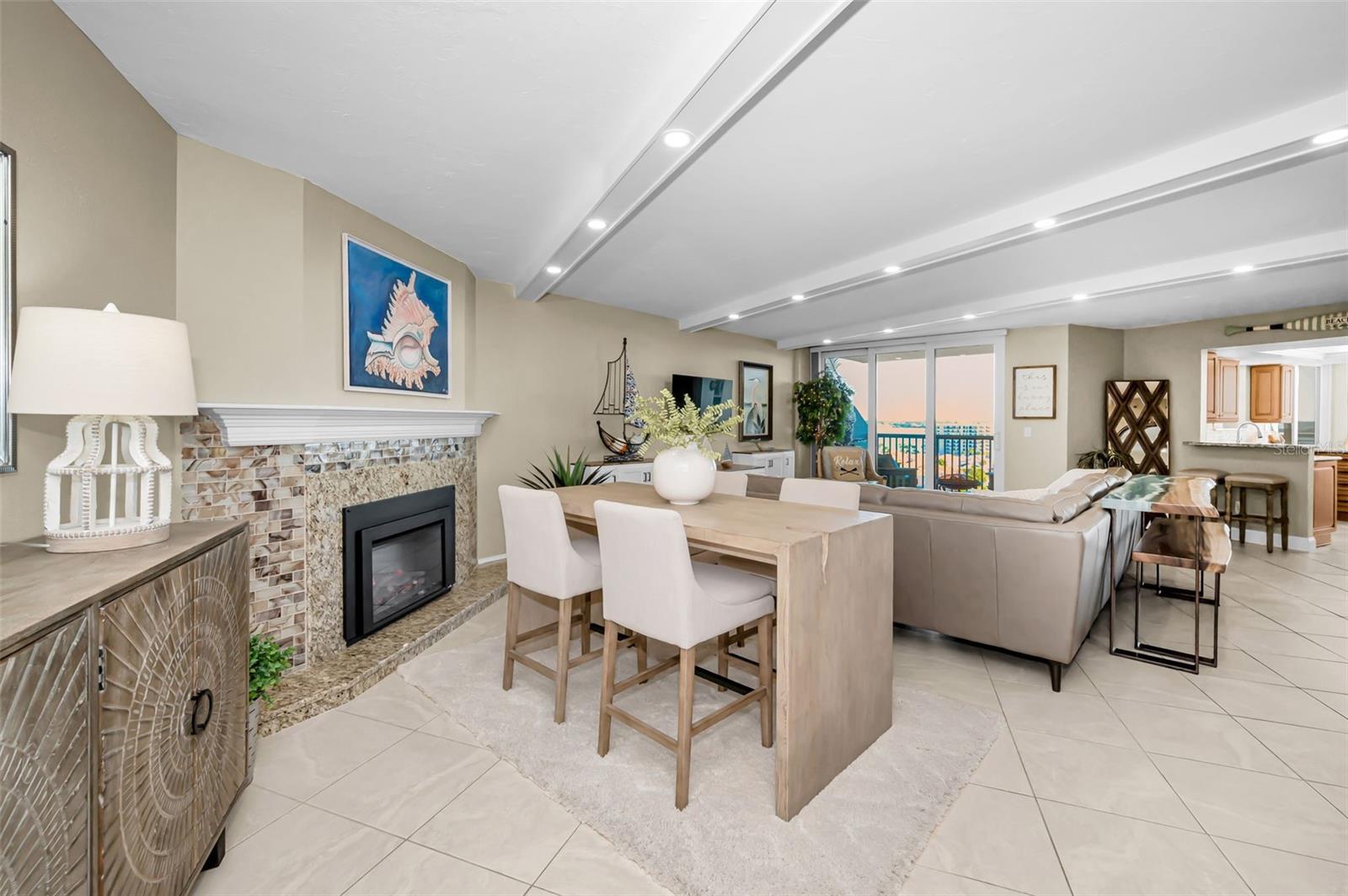 Elegant Grand Salon offering generous living space and a striking tiled fireplace