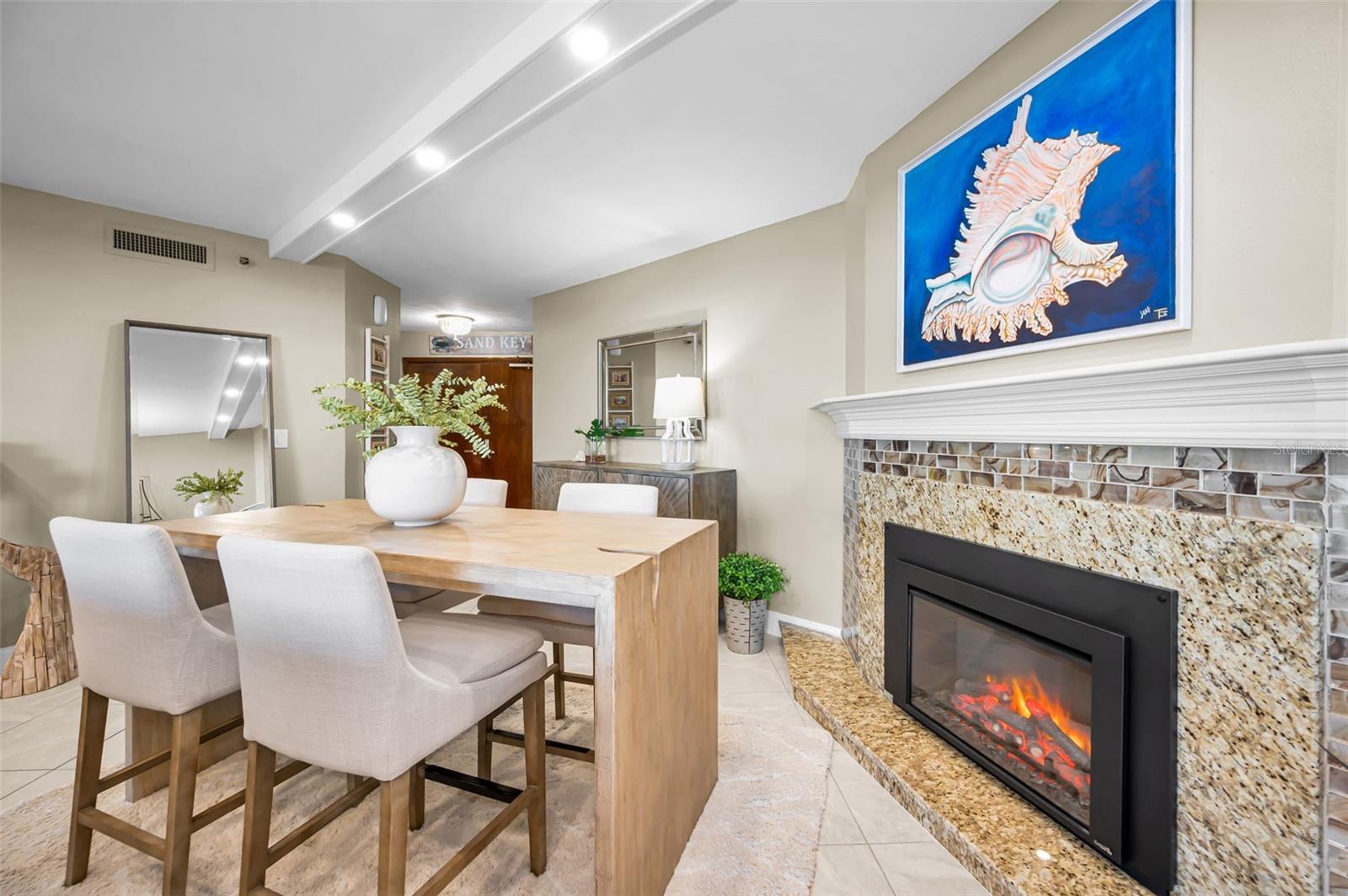 Expansive Living Area anchored by a beautifully tiled fireplace