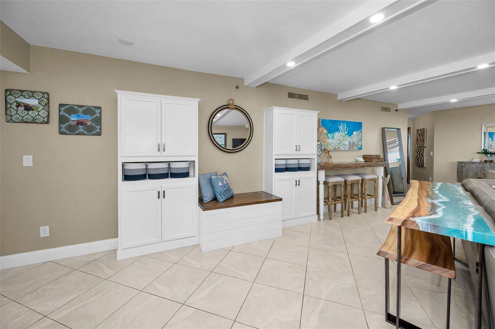 Master-crafted cabinetry and display shelving