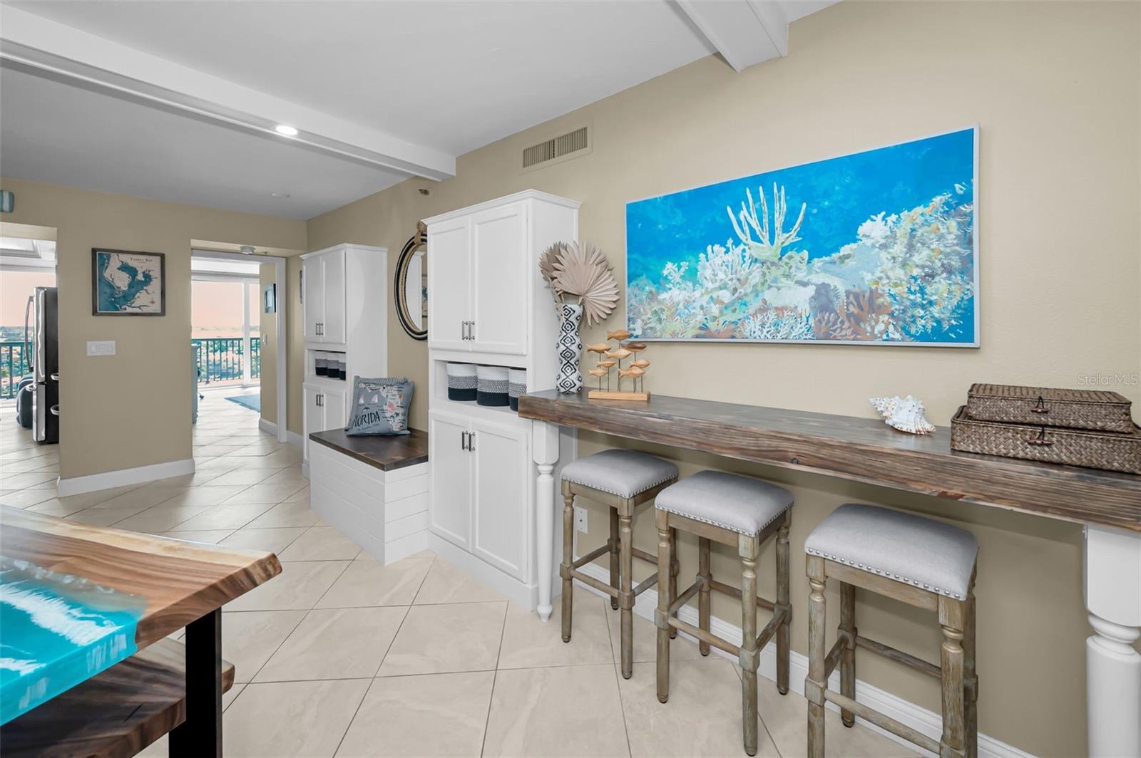 Artisan crafted built-ins and hand finished, wall mounted cabinetry