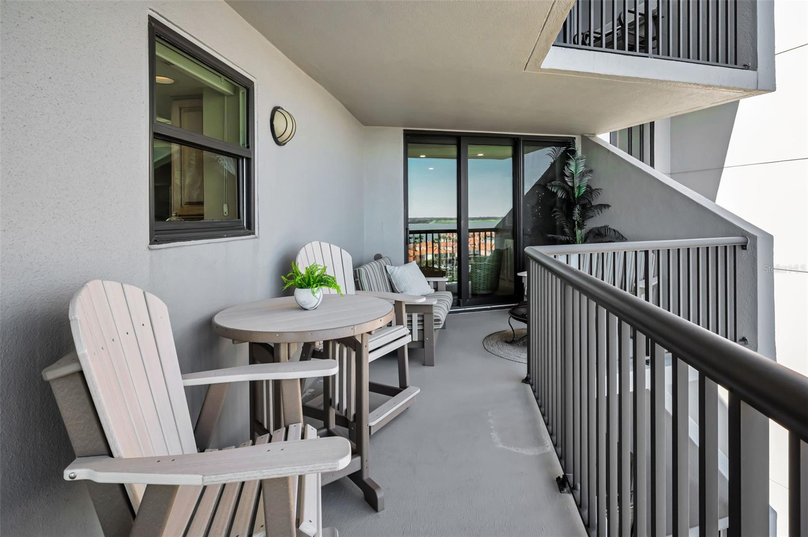 Step out onto to your large waterfront balcony off the Living area