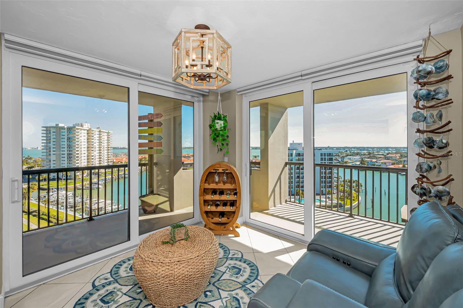 A versatile, sunlit flex room sized for family gatherings and capturing stunning, horizon-to-horizon waterfront views