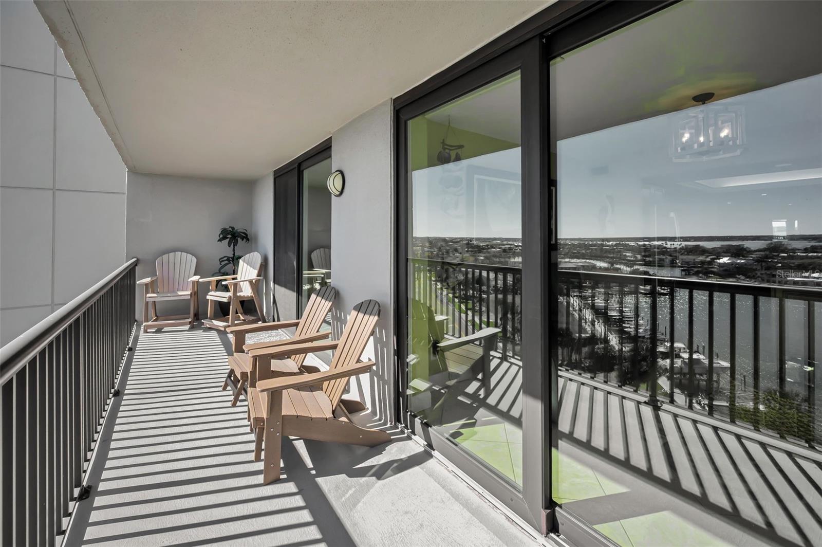 The other half of the large wraparound balcony off the Primary Bedroom