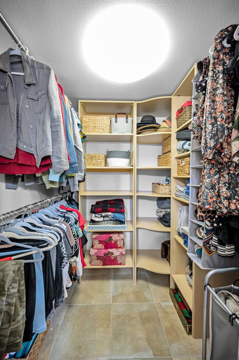 Large walk-in closet in the Primary bedroom