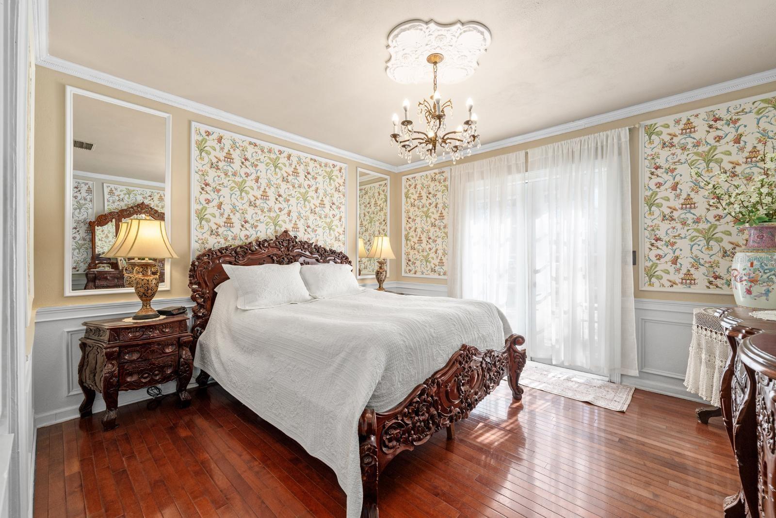 PRIMARY BEDROOM WITH FRNECH DOORS