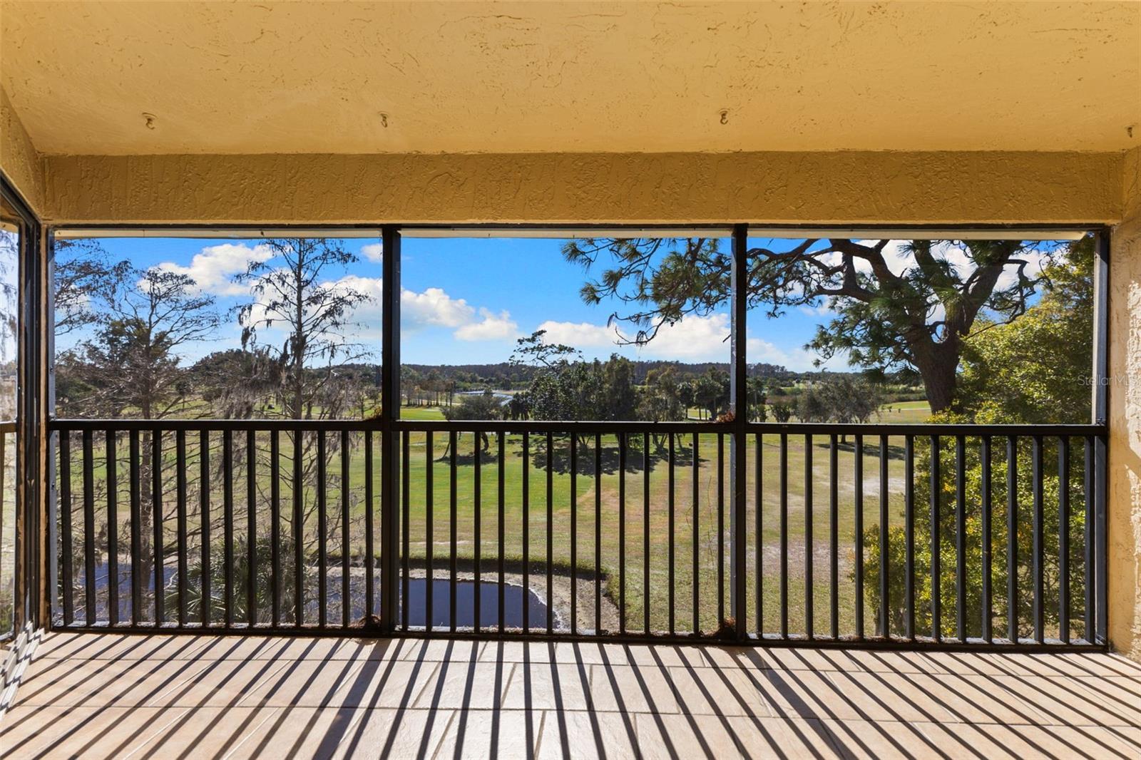 A golf course view from the third floor balcony.