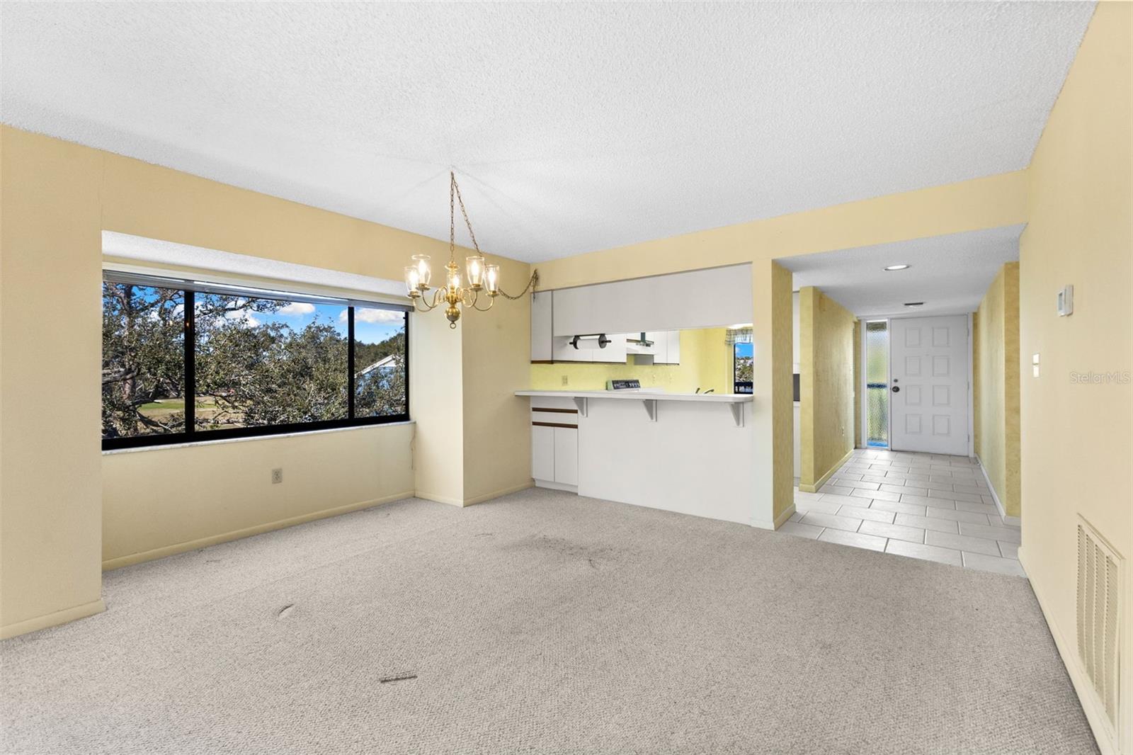 Great Room with Dining Area and Large Window Looking out in to Conservation Area