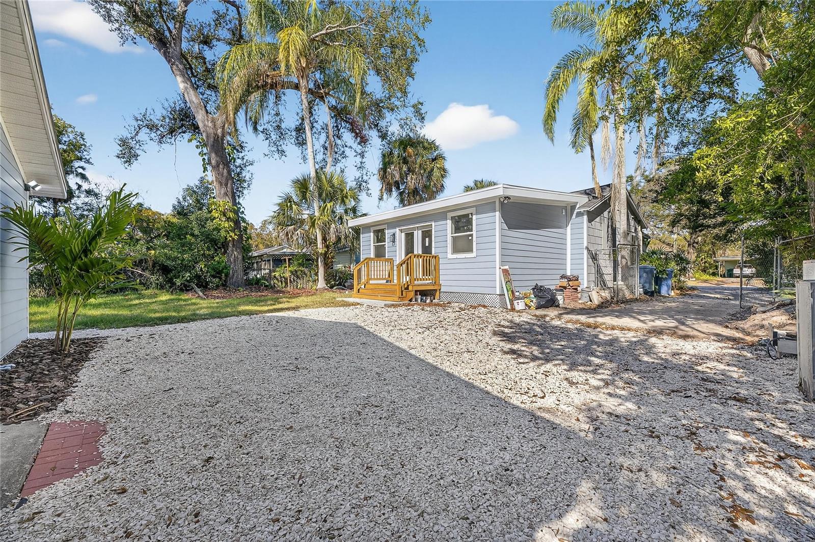 Shelled driveway for rear of property