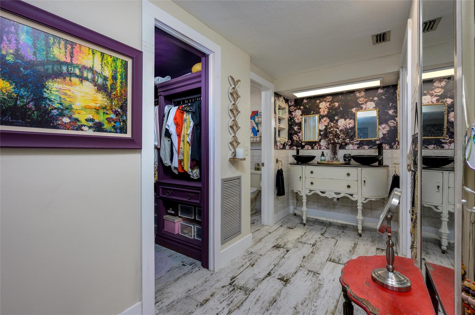 View of closet and vanity area