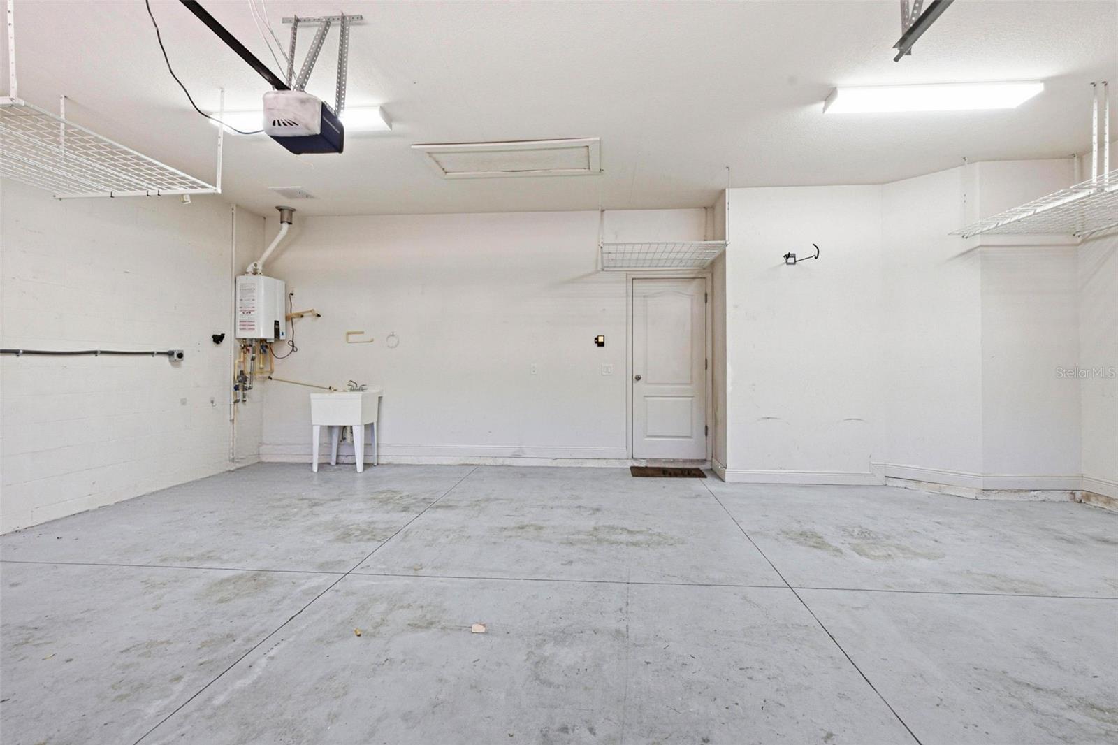 Three Car Garage With Upper Storage