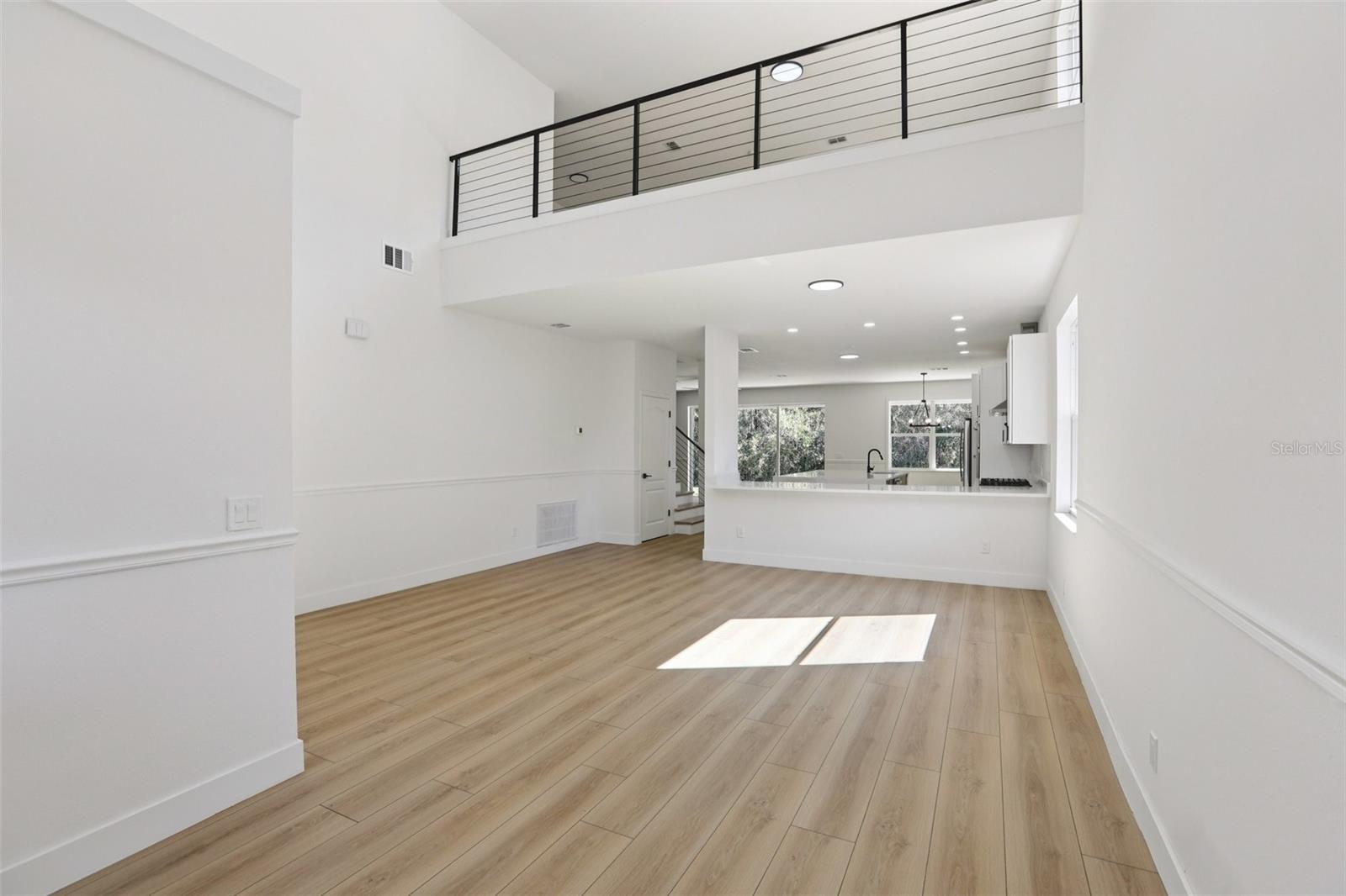 Kitchen with Formal Living Room / Dining Room Combo