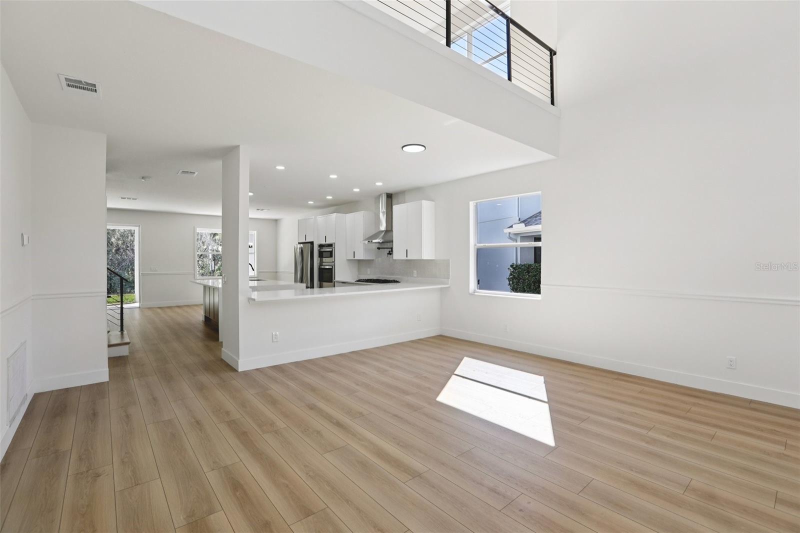 Kitchen with Formal Living Room / Dining Room Combo