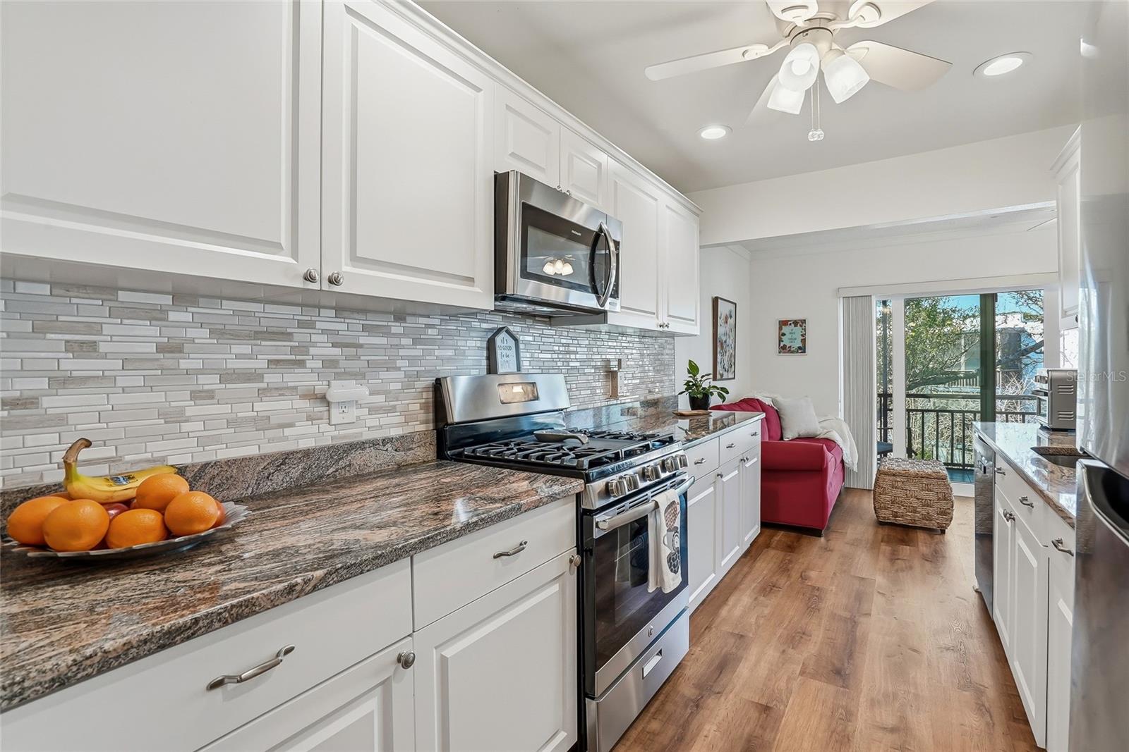 Stainless steel appliances with a brand new refrigerator.