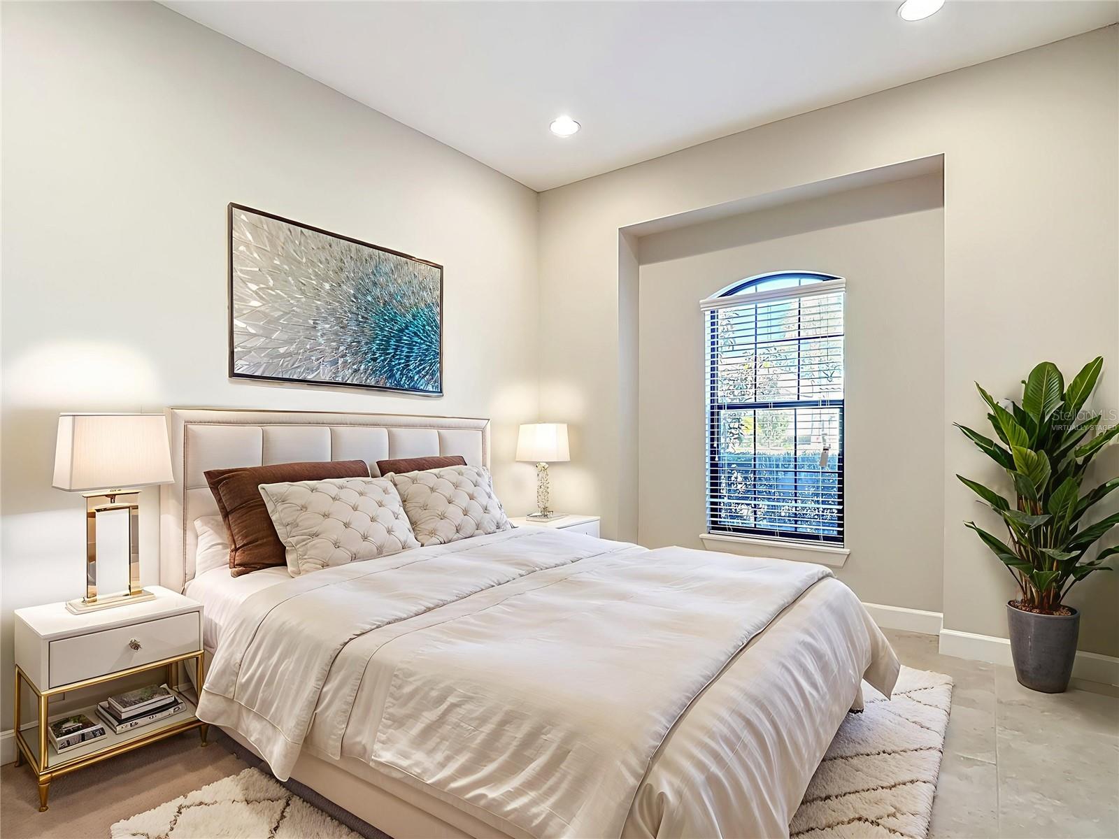 Virtually staged Bedroom 2 at front of home