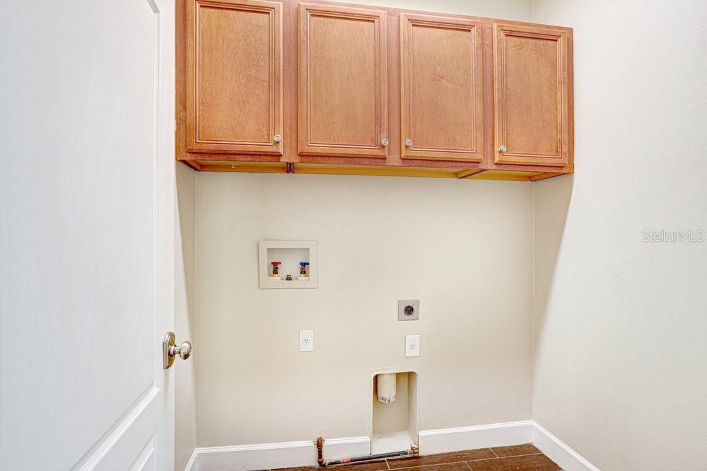 Laundry Room off of Kitchen and Dining Room