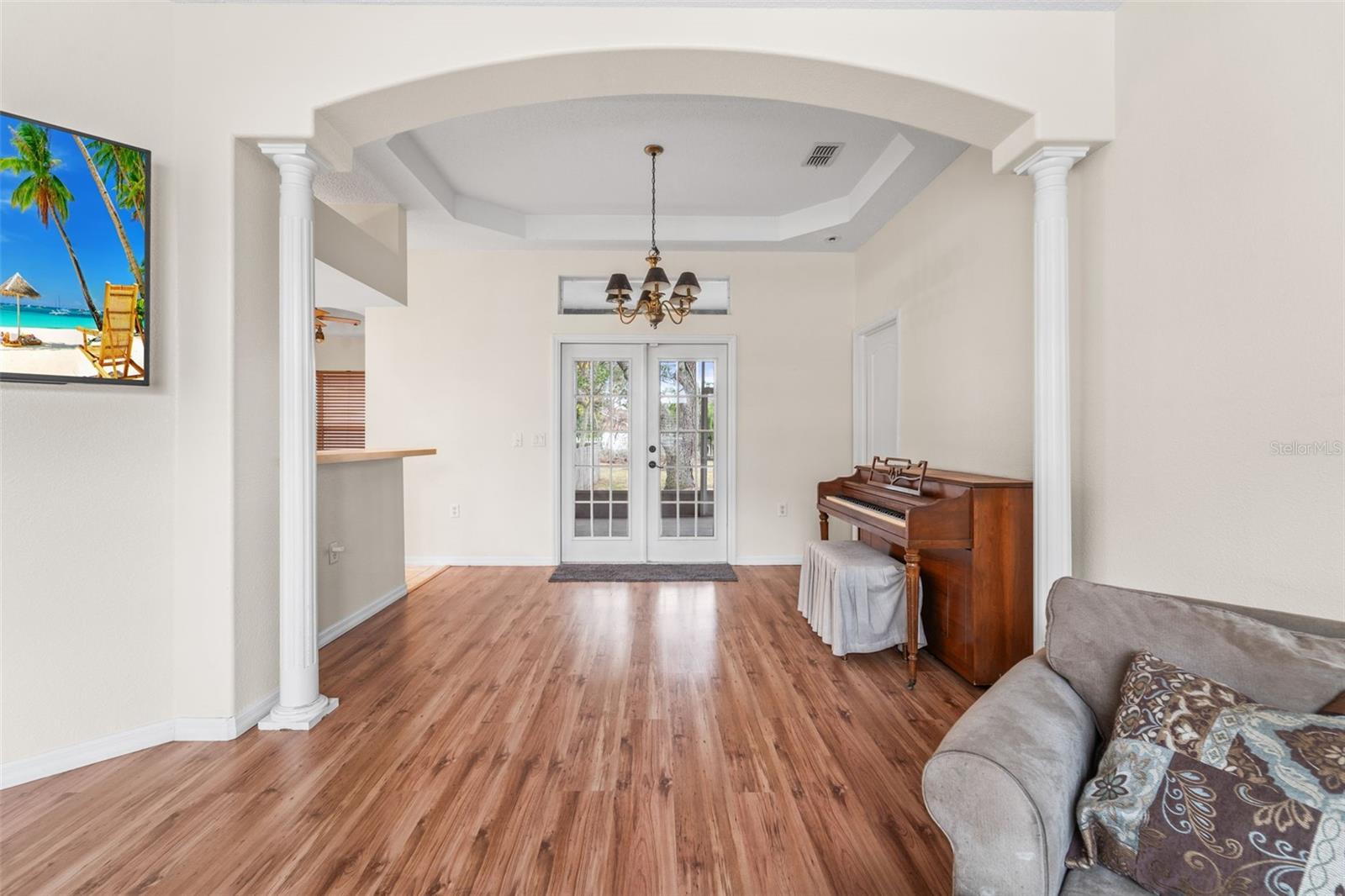 Living room into dining room view
