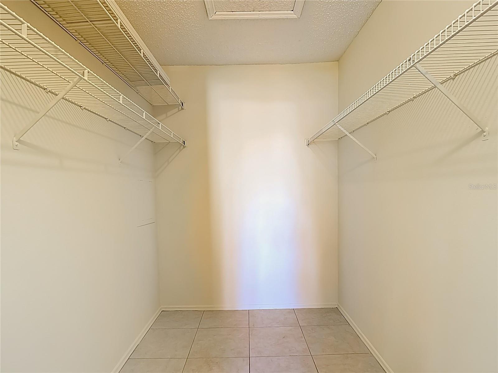 Huge Primary Closet with wire shelving!