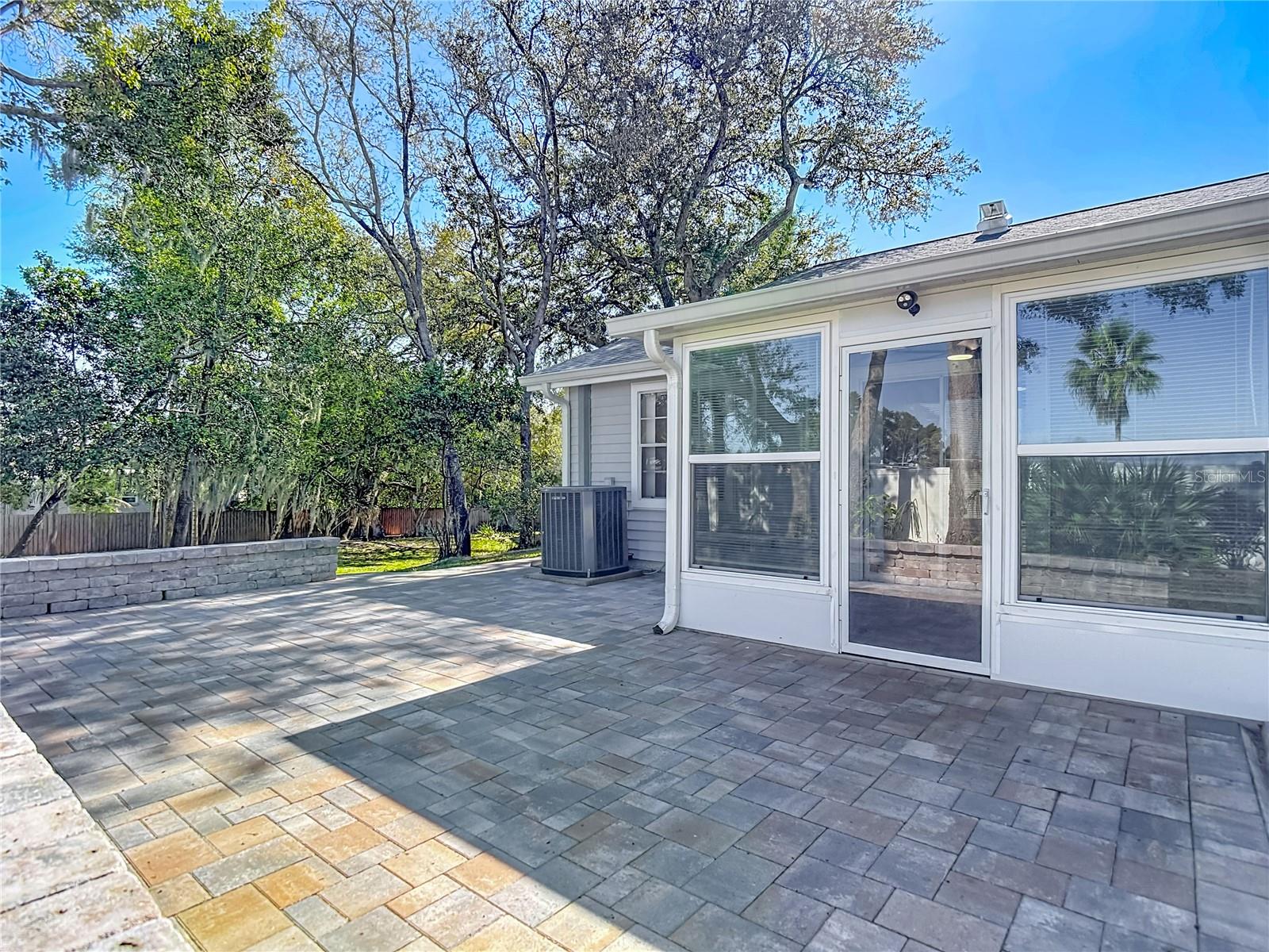 Paver sitting wall is a great area for entertainment!