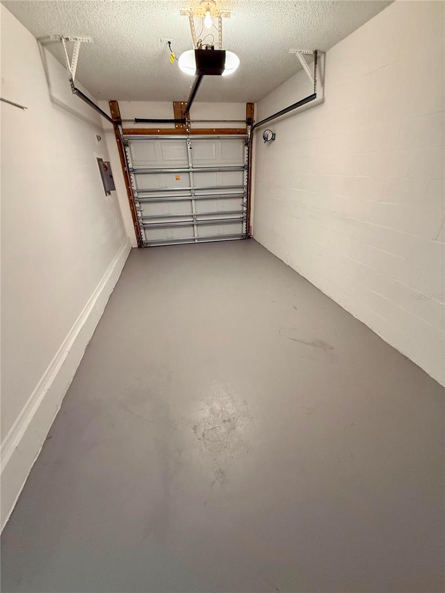 Painted garage floor and slow closing belt garage operer!