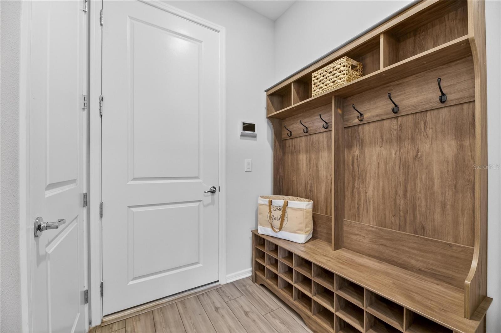 Drop off zone leading from garage